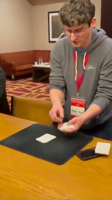Kevin performing at a magic convention